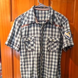 A great Men's snap front plaid short sleeve shirt with front snap pockets